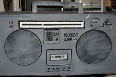 an old radio sitting on top of a table