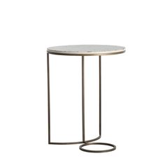 the side table is made from metal and has a round marble top with an iron base