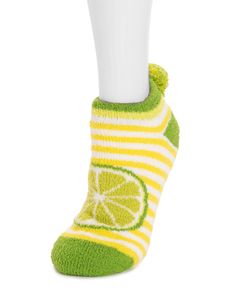 Experience ultimate coziness and playfulness with MUK LUKS Women's Cozy Footie Cabin Socks – the perfect blend of comfort and style for your feet. Featuring a faux sherpa lining, these cabin socks offer a soft and plush feel, enveloping your feet in a warm embrace. The whimsical fruit designs and pom detail at heel add a playful touch to your loungewear. The No-Skid PVC Pattern Sole ensures stability and traction, allowing you to move around with confidence on various indoor surfaces. These MUK LUKS Cozy Footie Socks are designed to make your downtime delightful, providing warmth and whimsical charm in every step. MUK LUKS® Women's Cozy Footie Cabin Sock Sole: PVC Non-Skid; Upper: 98% Polyester, 2% Spandex; Lining: 100% Polyester Faux Sherpa Machine wash cold, non-chlorine bleach when need Lime Slice, Fruit Designs, Cabin Socks, Fruit Design, Best Fruits, Fruit Pattern, Slipper Socks, Color Swatch, Lining Fabric