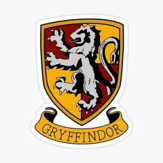 a yellow and red crest sticker with the word greyfindor on it's side