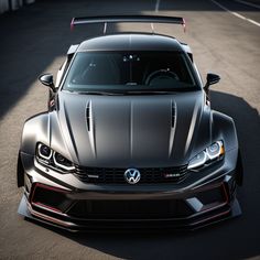 the front end of a silver sports car