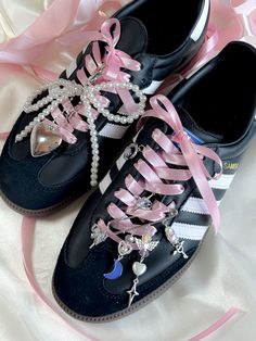 Add some sparkle and charm to your sneakers with these unique Pearl Shoelace Charms. Handmade with love and crafted from stainless steel, these shoe accessories are built to last. -Features a beautiful pearl bow tie design that adds a touch of elegance to your kicks. -Kpop fashion style meets balletcore and fairycore trends for a chic yet playful look. -The Y2K Silver Charms give off a trendy vibe that makes these charms perfect for any sneaker collection. Add some twinkle star charms for an ext Steletoes Shoes Beads Charms In Store, Shoe Lace Decoration, Sneaker Charms Diy, Decorated Shoe Laces, Bows On Shoes, Sneakers With Charms, Pink Lace-up Sneakers For Gift, Sock Trends 2024, Charms On Shoes