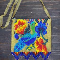 This unique Mexican hand beaded Chaquira crossbody bags are unique. Perfect for any occasion and fun to wear. Add a pop of color to your outfit. Measurements: 8 x 6.5 inches Strap about 21 inches Visit us at Omxboutique.com Beaded Shoulder Bag For Festivals Gift, Traditional Beaded Shoulder Bag As Gift, Beaded Shoulder Bag Gift, Everyday Rectangular Shoulder Bag With Colorful Beads, Everyday Beaded Shoulder Bag, Bohemian Rectangular Bag With Colorful Beads, Beaded Pouch Shoulder Bag As Gift, Beaded Pouch Shoulder Bag For Gift, Bohemian Multicolor Beaded Necklaces For Everyday Use