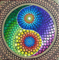 a colorful painting with circles and dots on it