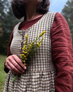 The Kitchen Garden Dress offers timeless elegance.  Discover the perfect blend of comfort and style with our gathered waist linen dress, handcrafted in the heart of Appalachia. Made from premium OEKO-TEX certified linen, this dress embodies quality, sustainability, and timeless charm. Key Features: - Breathable, high-quality linen fabric - Deep inseam pockets - Gathered waist for a flattering silhouette - Four-season wearability - Customizable length options From garden parties to woodland strolls, casual dinners to everyday errands, this dress effortlessly transitions through your day. Its adaptable nature makes it a true wardrobe staple, easily layered over wool base layers and paired with a cozy cardigan for cooler months. Embrace the freedom of customization: - Alter the length to suit Maximalist Wardrobe, Mum Style, Moody Vibes, Post Partum Outfits, Linen Layers, Mum Fashion, V Cute, Garden Dress, Gathered Dress