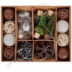 an open box filled with different types of ornaments