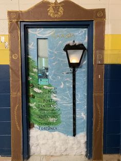 a door with a christmas tree painted on it and a lamppost in the middle