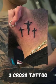 three cross tattoo designs on the neck and back of a man's head with chains around his neck