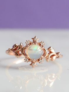 Just like a celestial cloud of new beginnings, each Nebula Ring is a one of a kind piece that will help light the way to your biggest and brightest potential. For the first time ever we are featuring genuine ethiopian opals in this ring, which beyond its captivating beauty will awaken creativity and intuition in its wearer. 🔮 * * * Don't know your ring size? View our Ring Size Guide * * * …………………………………. RING SIZE & MATERIAL❋ 18k gold plated sterling silver❋ cubic zirconia crystals❋ natural ethi Nebula Ring, Crystals Natural, Cloud Ring, Galaxy Ring, Celestial Ring, Opal Wedding Rings, Opal Wedding, Ethereal Wedding, Light The Way