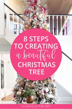 a beautiful christmas tree with pink and white decorations