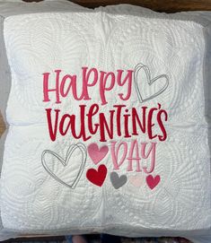 a pillow that says happy valentine's day on it