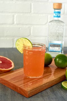 grapefruit, lime and watermelon on a cutting board