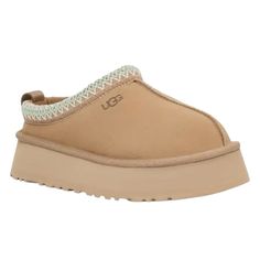 Ugg Tazz Platform Clog. Women’s Size 8. New In Box. Color - Sand. Guaranteed Authentic With Ugg Hologram Tag Inside Shoe (See Photos). Suede Upper. Uggbraid. 10mm Uggplush Lining And Insole. Eva Midsole And Outsole. 1.75” Platform Height. Ugg Logo Heat Embossed. Ships Fast With Care From A Smoke-Free, Pet-Free Environment. Trusted Poshmark Seller Since 2017. Ugg Tazz Platform, Ugg Tazz, Shoes Ugg, Inside Shoes, Platform Clogs, Color Sand, Sand Color, Box Color, Cool Fashion