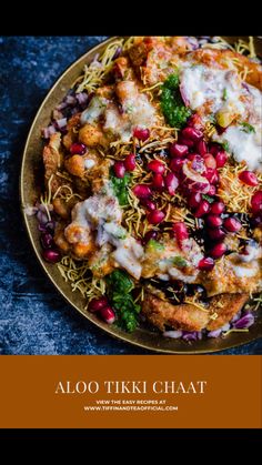 aloo tiki chaat with pomegranates and shredded cheese