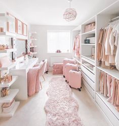 a bedroom with white walls and shelves filled with pink furniture, including a large rug on the floor