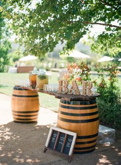 an image of a table with wine glasses on it and a sign that says napa wedding from matt edge