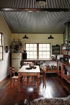 the kitchen is clean and ready to be used as a dining room or living area