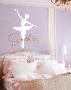 a ballerina wall decal with the word gymnastics on it