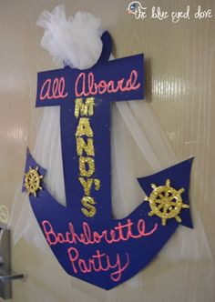 an anchor sign is hanging on the door to celebrate someone's birthday or other special occasion