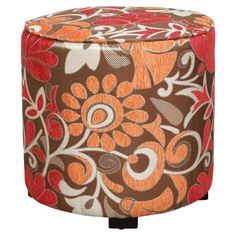 an orange and brown floral print ottoman