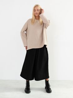 "RUMI is a long sleeve loose fit linen blouse. DETAILS - Oversized fit - Long sleeves - Boat neckline - 100% lightweight European linen fabric - Cut and sewn to order just for you in our studio COLOR - Beige, you can also choose other colors above - Fabric samples are available here https://www.etsy.com/listing/586569696/linen-fabric-samples SIZING & FIT - Relaxed, loose fit - Length is approximately 26 inches / 66 cm - Bust is approximately 26.5 inches / 67 cm - Measurements taken from a si Oversized Beige Blouse For Fall, Oversized Neutral Blouse For Fall, Long Sleeve Linen Top For Winter, Versatile Long Sleeve Beige Blouse, Versatile Beige Long Sleeve Blouse, Fall Batwing Sleeve Relaxed Fit Blouse, Effortless Long Sleeve Relaxed Fit Sweater, Fall Relaxed Fit Batwing Sleeve Blouse, Effortless Relaxed Fit Long Sleeve Sweater