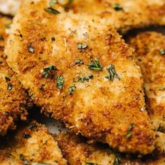 fried chicken with herbs and seasoning on top