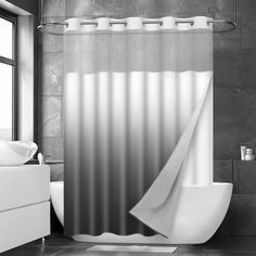 black and white photo of bathroom with shower curtain