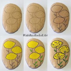 four rocks with flowers painted on them