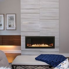 a living room with a fire place in the fireplace