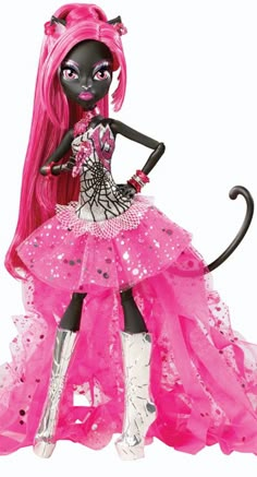 a black cat doll with pink hair wearing a dress and white boots, standing in front of a white background