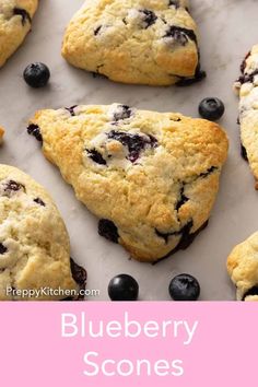 blueberry scones on a baking sheet with text overlay