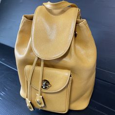 Givenchy Flap Backpack Drawstring Bucket Bag Leather Yellow Gold Logo Women's Description ◆Brand Givenchy ◆Material　  Leather ◆Pattern Solid ◆ Accessories none ◆Product condition There is no noticeable scratches or dirt. Approximate guide (There may be some differences.) Shipping We ship with basically fast FedEx. However, some items cannot be delivered by FedEx. At that time, we may use DHL, EMS, or international parcels. We will ship the item 1～5 business days after your payment clears.  To our customers Thank you very much for your bidding and shopping! Goods are expensive and you may hesitate to purchase them even more it is second hand and from abroad. Therefore, we will make sincere efforts to give customers a sense of reassurance with providing highest standard of customer service.I High-end Shopping Bucket Bag With Gold-tone Hardware, Luxury Bags With Gold-tone Hardware In Bucket Shape, Gold Bucket Bag With Gold-tone Hardware, Gold Leather Bucket Bag With Gold-tone Hardware, Yellow Bucket Bag With Gold-tone Hardware, Flap Backpack, Drawstring Bucket Bag, Leather Bucket Bag, Gold Logo