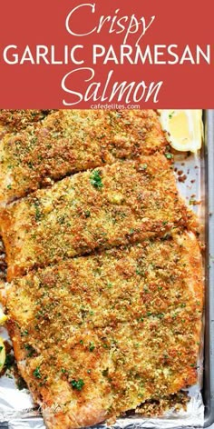 crispy garlic parmesan salmon with lemons on the side