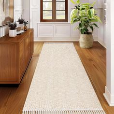 a large white rug in the middle of a room