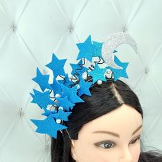 Each part Blue celestial crown is 100% hand made. Each parts Moon goddess crown is made by my hands with love for you. This Star fascinator is made of glitte foam. The base of the Space headband is made of wire that is wound with a floral tape. The stars are made by hand and fastened to the base with felt.  The height of the star crown is about 4 inches (10.5 cm). More of my star crown you can see here  https://www.etsy.com/ru/shop/byIraFomina?ref=hdr_shop_menu&section_id=24362623 Thank you for attention. Have a nice day. Blue Crown Headpiece For Party, Handmade Whimsical Crown For Parties, Blue Party Crown Headpiece, Blue Headpiece For Party, Space Headband, Moon Goddess Crown, Celestial Crown, Star Crown, Goddess Crown