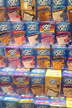 many boxes of pop tarts are stacked on top of each other