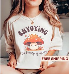 This Retro Mushroom Trendy Shirt is a great Birthday Gift for nature  lovers. The Comfort Colors 1717 is a unisex t-shirt and fits like a dream. Made 100% with incredibly soft, ring-spun cotton, each tee is soft-washed and garment-dyed. Its relaxed fit makes it the perfect daily choice for any casual occasion. .: 100% ring-spun cotton .: Medium fabric (6.1 oz/yd² (206.8 g/m .: Garment-dyed fabric .: Relaxed fit .: Sewn-in twill label It is recommended to wash with like colors for the first wash. Mushroom Shirt Design, Trendy Tees, Trendy Tee, Trendy Shirts, Gifts For Nature Lovers, Birthday Gifts For Her, Style Vintage, Vintage Stil, Comfort Colors