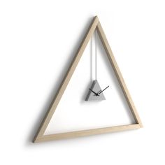 a triangle shaped clock mounted to the side of a white wall with a wooden frame