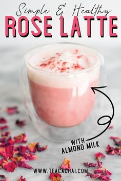 rose latte with almond milk in a glass surrounded by pink flower petals and text overlay reading simple & healthy rose latte