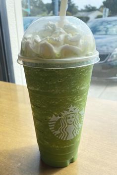 a starbucks drink with whipped cream on top