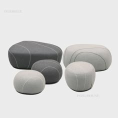 four different types of stools and footstools are shown in this set up