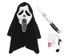 a black and white costume with a scream mask on it's face next to a knife