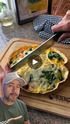 a man is cutting into a pizza with a large knife