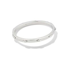 Build up your bracelet stack with the Abbie Metal Bangle Bracelet in Silver. This classic bangle features high-shine metal and a repeated motif of our Abbie shape, so it’ll pair perfectly with your other favorite bracelets. Metal: Rhodium Over Brass Closure: Lobster Clasp Size: Small/medium has a diameter of 2.25" and medium/large has medium/large has a diameter of 2.5". Due to the one-of-a-kind nature of the medium, exact colors and patterns may vary slightly from the image shown. Classic Bangles, Bracelet In Silver, Kendra Scott Necklace, Giddy Up Glamour, 20 Gifts, Bracelet Stack, Kendra Scott, Accessories Bracelets, Hat Hairstyles