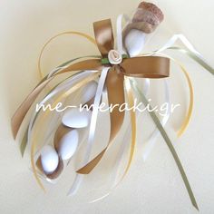 an easter decoration with eggs and ribbons