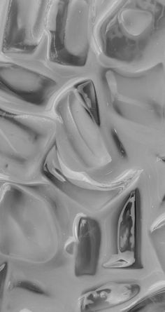 an abstract black and white photograph of liquid