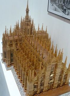 a model of a building made out of wood