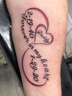 a tattoo with two hearts and the words, love is in my heart on it