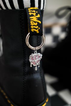 Add some love and charm to your boots with these Pink Chained Heart Boot Charms! These adorable charms feature a chained heart design that will surely catch everyone's attention. Perfect for adding a touch of personality to your footwear, these charms are a must-have for any fashion-forward individual. Charms are sold as a pair Trendy Silver Shoe Charms For Gifts, Boot Charms, Shoe Clips, Shoe Charms, Heart Design, Brooch Pin, Clothing And Shoes, Fashion Forward, Charms