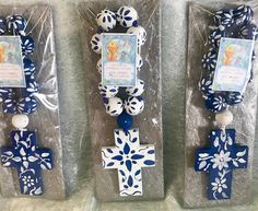 three blue and white crosses are on display